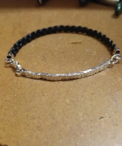 Bracciale in piastra martellata e cuoio BRACCIALETTI